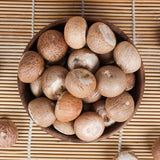 Whole white betel nuts (Sabut Supari) used for health remedies, oral care, and religious rituals, offering natural digestive and energizing benefits.