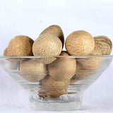 Whole white betel nuts (Sabut Supari) used for health remedies, oral care, and religious rituals, offering natural digestive and energizing benefits.