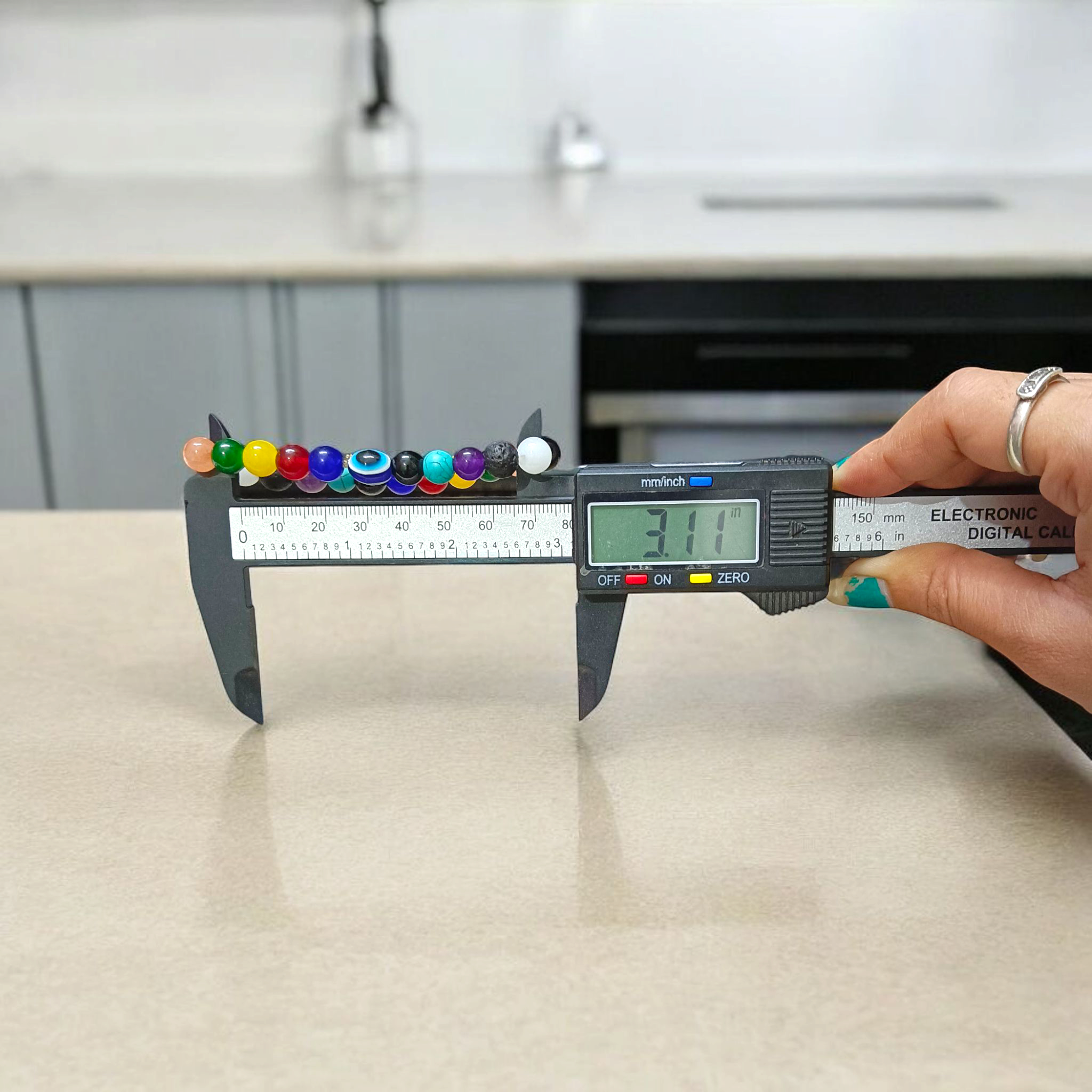 7 Chakra Healing Bracelet with Mix Agate & Evil Eye Beads on White Background