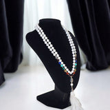 7 Chakra with White Agate Mala featuring seven vibrant chakra stones and white agate beads for energy balance, spiritual healing, and calmness
