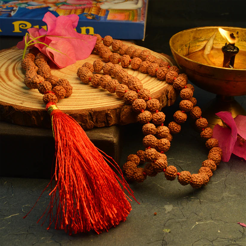 7 Mukhi Rudraksha Mala blessed by Mahalakshmi, lab-certified for wealth attraction, available in 27+1, 54+1, and 108+1 bead variants by Gurupujan.