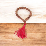 7 Mukhi Rudraksha Mala blessed by Mahalakshmi, lab-certified for wealth attraction, available in 27+1, 54+1, and 108+1 bead variants by Gurupujan