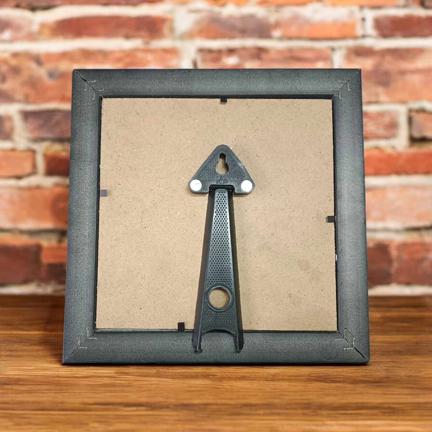 7x7 Inch Om Shanti Yantra mounted on raw Pyrite crystal in a Vastu-aligned wooden frame for peaceful home and spiritual décor