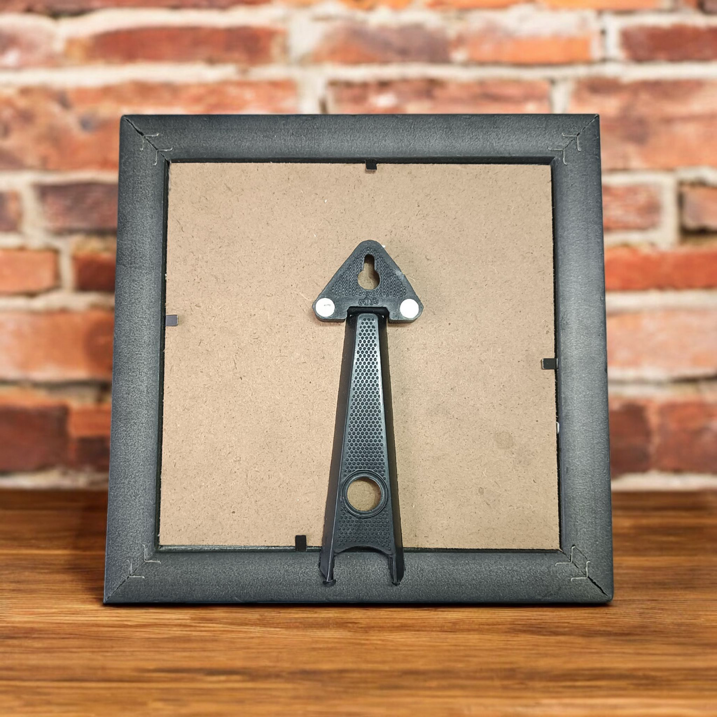 7x7 Inch Om Shanti Yantra mounted on raw Pyrite crystal in a Vastu-aligned wooden frame for peaceful home and spiritual décor