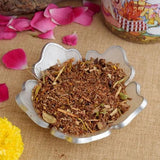 A 250GM pack of Hawan Samagri, containing a blend of sacred herbs, ghee, and wood, perfect for performing religious fire rituals and poojas.