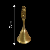 A 7cm Bajarng Balli Brass Hand Bell, crafted from pure brass, ideal for religious rituals, enhancing spiritual ambiance and inviting positive energy.