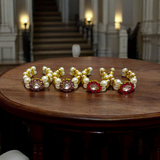A Laddu Gopal Moti Kada Set, consisting of delicate pearl bracelets designed to adorn Krishna idols, adding divine beauty and elegance during worship and festivals.