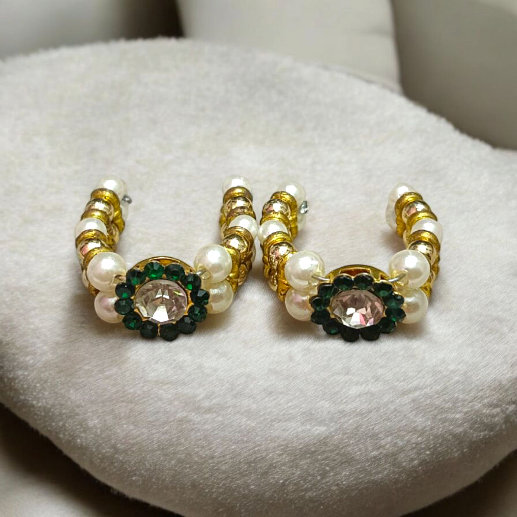 A Laddu Gopal Moti Kada Set, consisting of delicate pearl bracelets designed to adorn Krishna idols, adding divine beauty and elegance during worship and festivals.