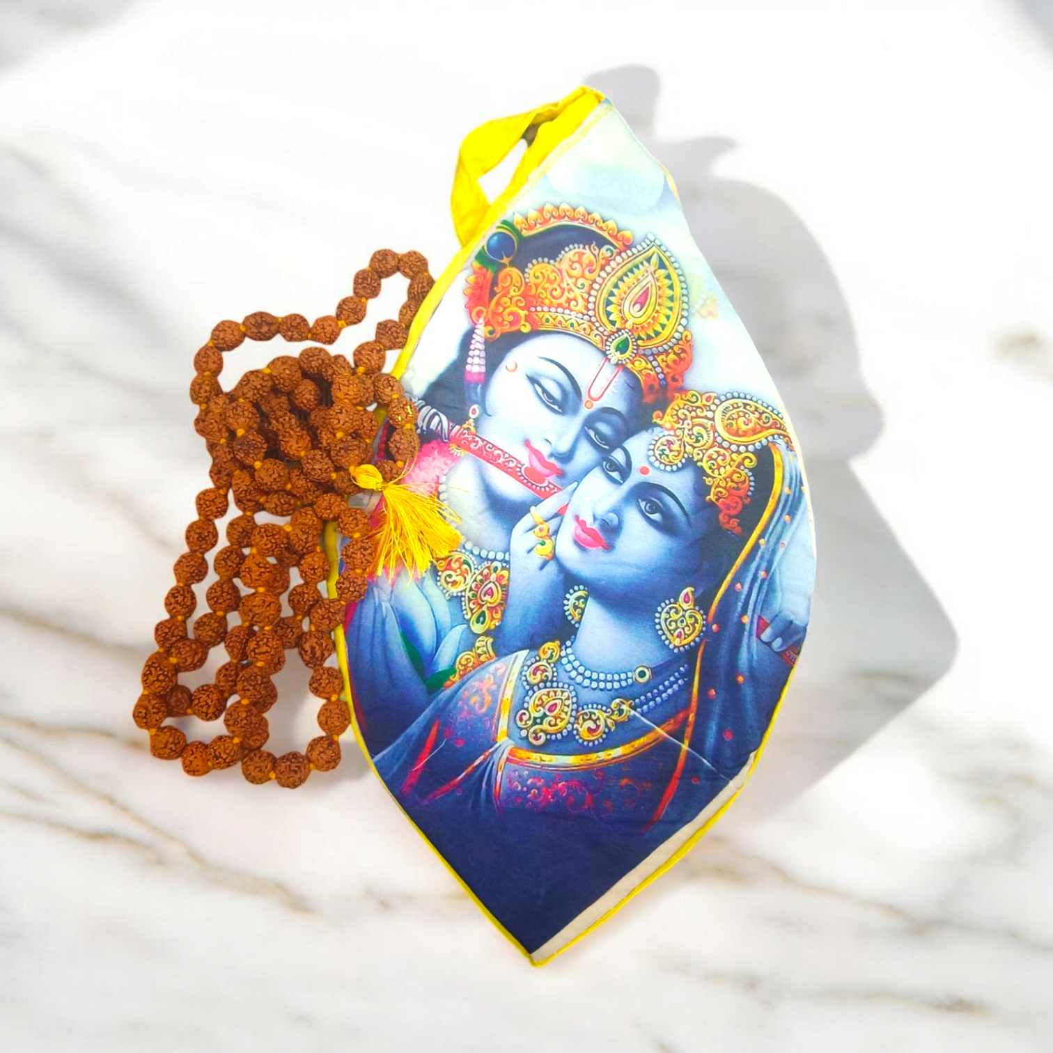 A Radha Krishna Gomukh Bag with a vibrant digital colourful print, ideal for storing prayer beads and spiritual essentials during mantra japa.