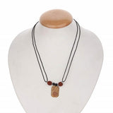 A Sidh Kaal Sarp Yog Nivaran Kavach Pendant, designed to offer protection against Kaal Sarp Dosha and bring peace, prosperity, and spiritual relief