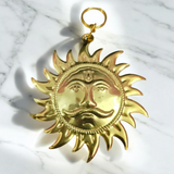 A Wall Hanging Sun made of pure brass with a golden finish, designed to protect from Vaastu dosh, Shani dosh, and accidents, while inviting prosperity and positive energy into your space
