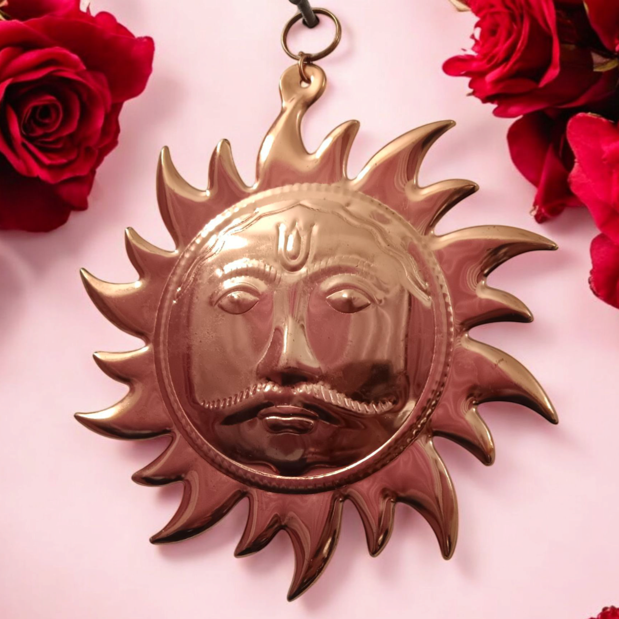 A Wall Hanging Sun made of pure copper with a golden finish, designed to protect from Vaastu dosh, Shani dosh, and accidents, while bringing positive energy and prosperity to your home or office