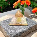 A White Stone Crystal Clear Orgone Pyramid, lab-certified for energy healing, emotional balance, and protection from negative energies and electromagnetic pollution