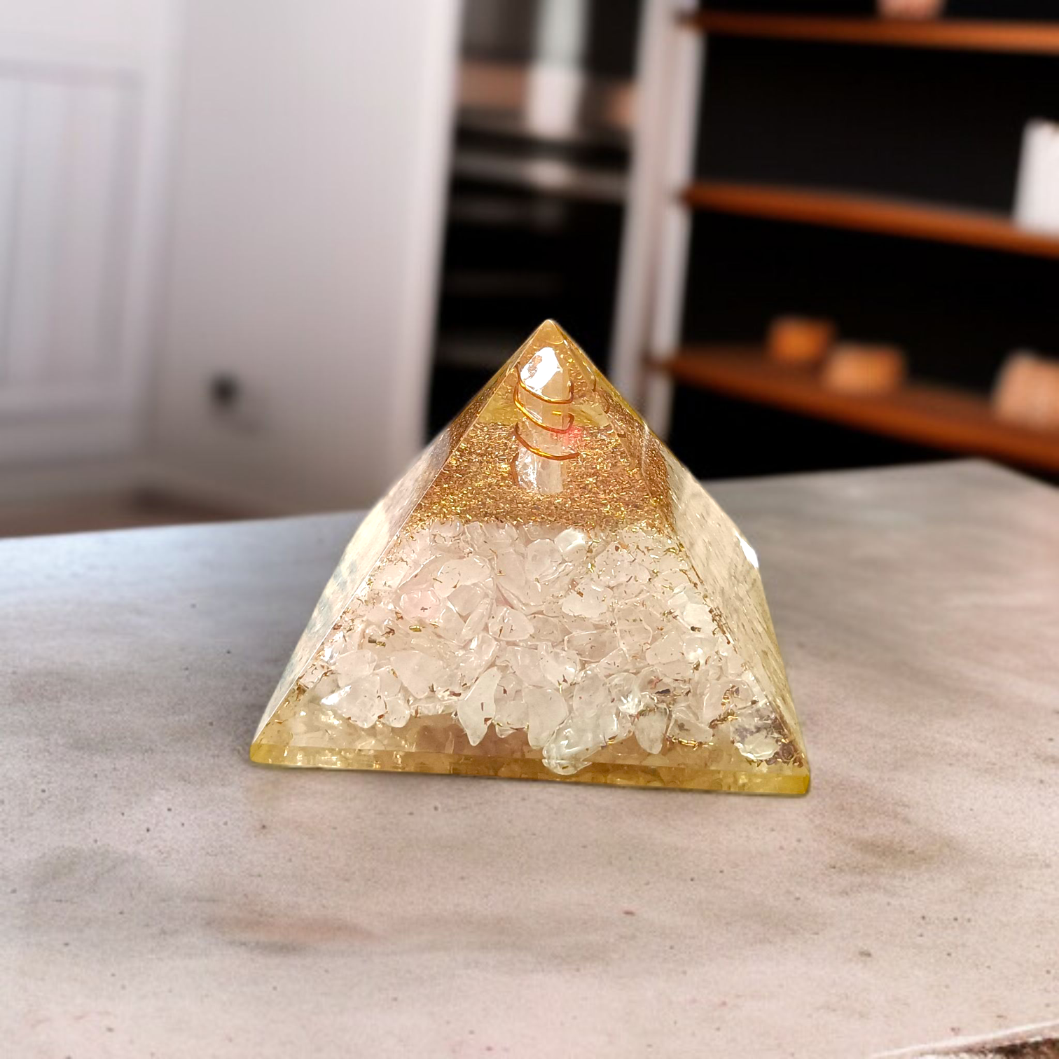A White Stone Crystal Clear Orgone Pyramid, lab-certified for energy healing, emotional balance, and protection from negative energies and electromagnetic pollution