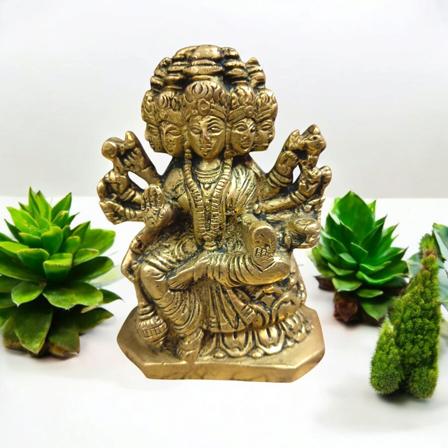 A beautiful 4-inch Gayatri Mata brass murti, gold-plated, with intricate craftsmanship, representing wisdom, knowledge, and spiritual enlightenment.
