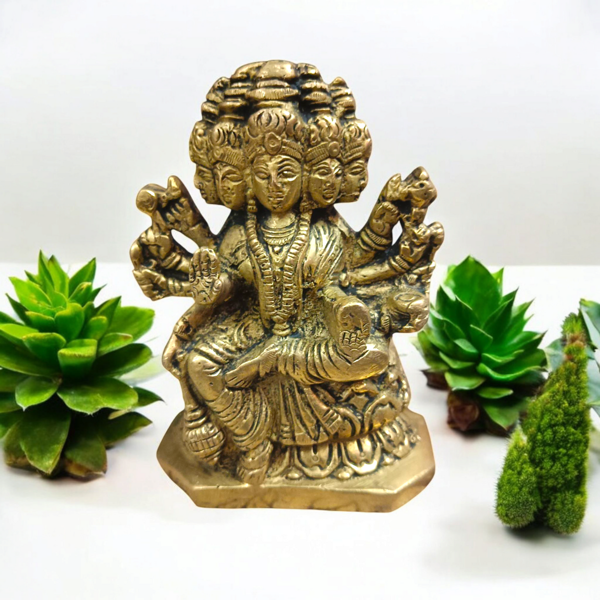 A beautiful 4-inch Gayatri Mata brass murti, gold-plated, with intricate craftsmanship, representing wisdom, knowledge, and spiritual enlightenment.