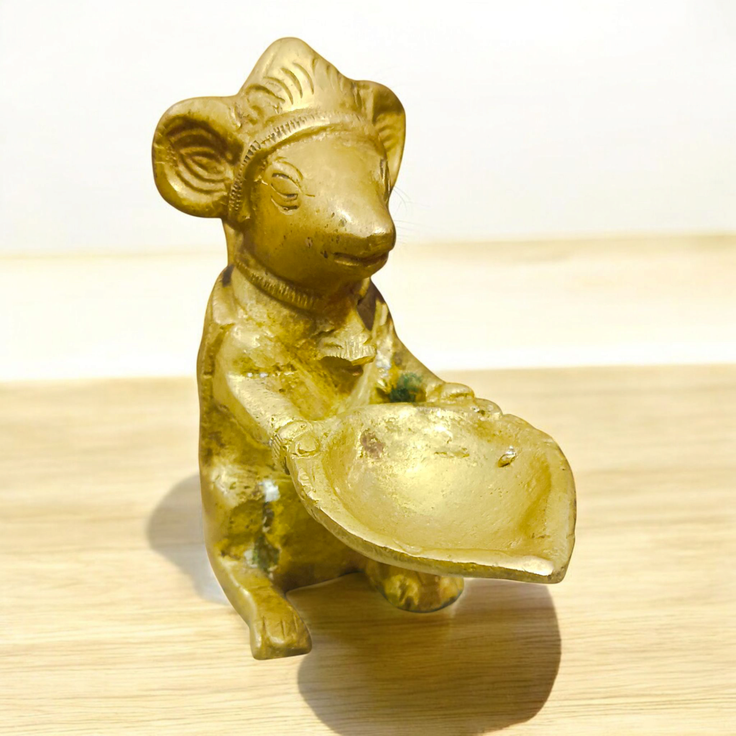  A beautiful Brass Ganesha Mooshak Diya Idol, 3 inches tall, ideal for home and temple use as a decorative oil lamp for pooja and rituals.