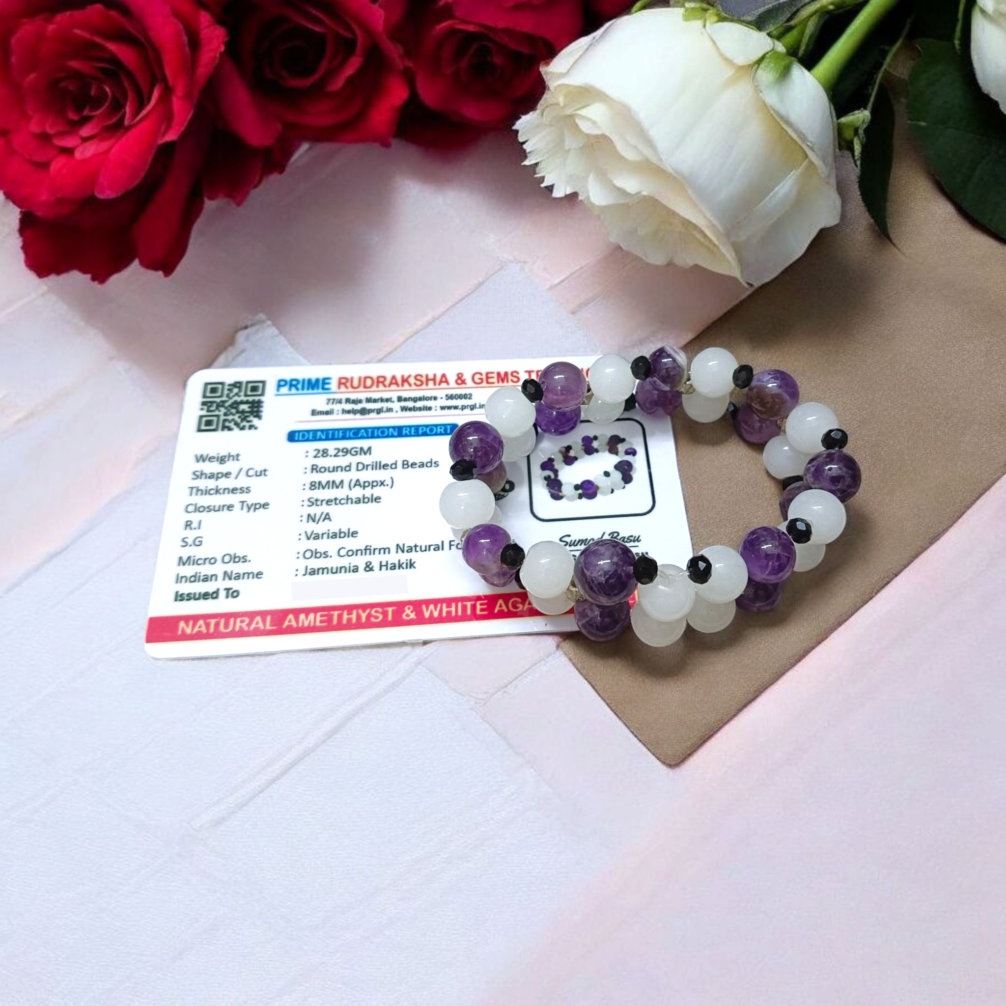A beautiful stretchable bracelet made with 8mm Amethyst and White Agate beads, perfect for healing, emotional balance, and inner peace