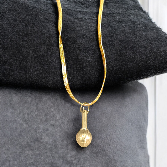 A beautifully crafted Hanuman Ji Gada Locket with a gold chain, symbolizing strength and protection, perfect for daily wear or spiritual practices.
