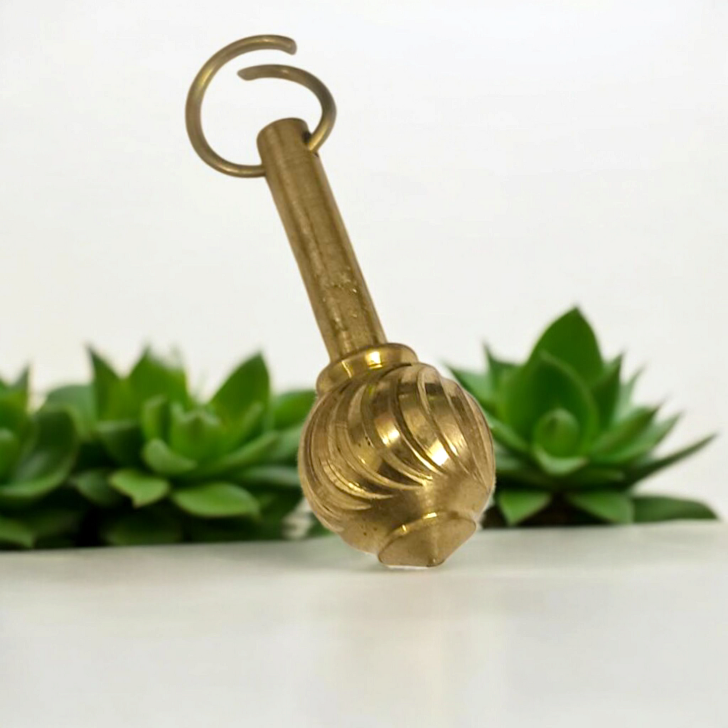 A beautifully crafted Hanuman Ji Gada Locket with a gold chain, symbolizing strength and protection, perfect for daily wear or spiritual practices.
