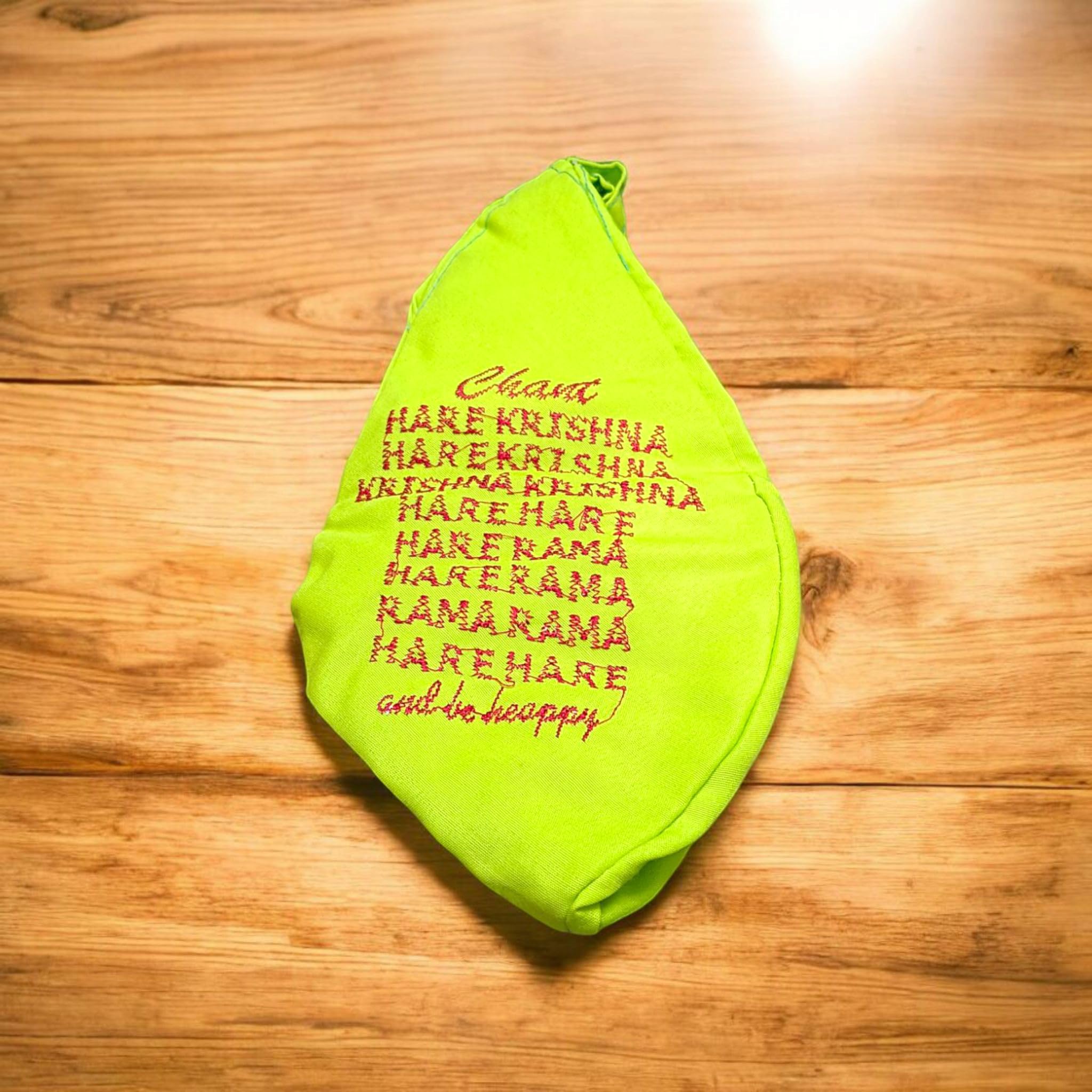 A beautifully crafted Laddu Gopal Gaumukhi Bag designed for storing Jaap Mala and other devotional items. The bag features a spiritual Gaumukhi design and is made from durable, high-quality fabric.