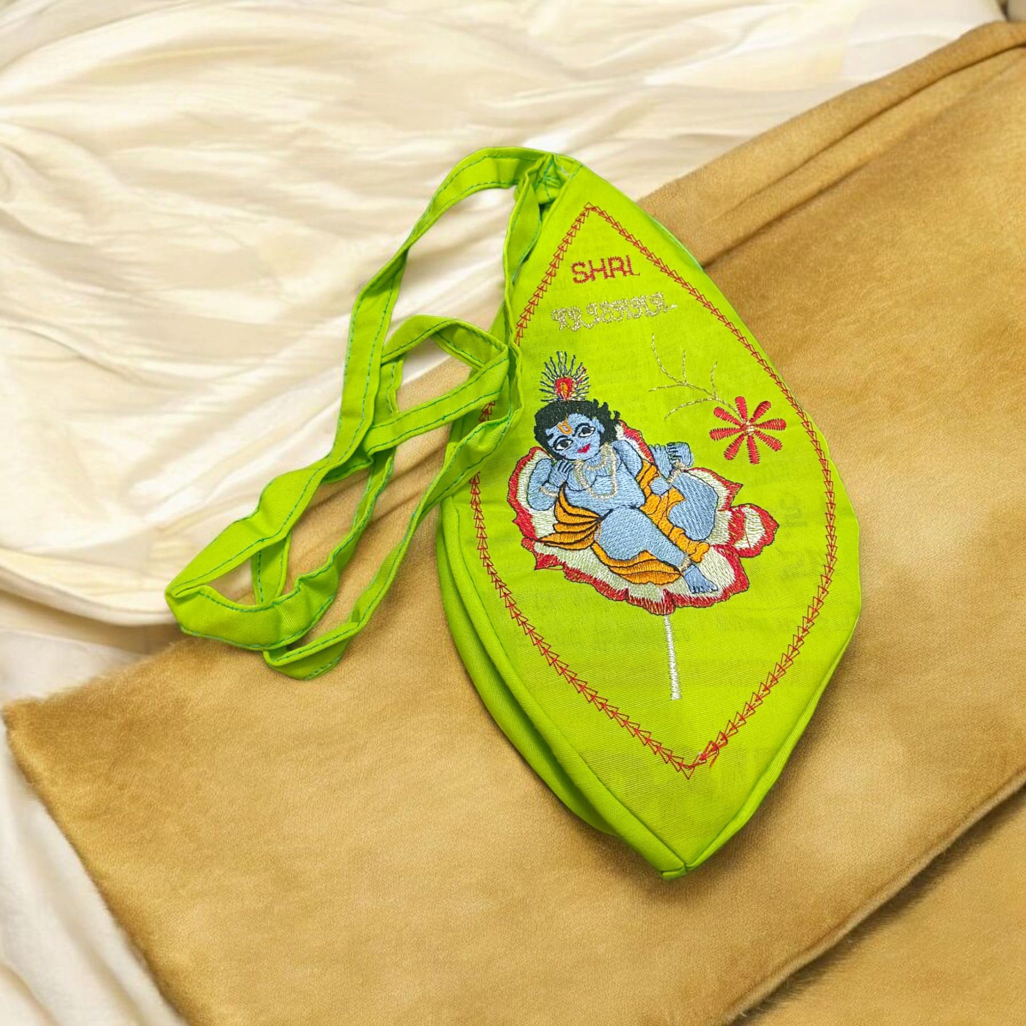 A beautifully crafted Laddu Gopal Gaumukhi Bag designed for storing Jaap Mala and other devotional items. The bag features a spiritual Gaumukhi design and is made from durable, high-quality fabric.