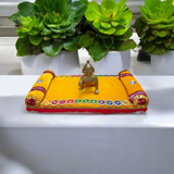 A beautifully crafted Laddu Gopal Singhasan Bed, ideal for Bal Gopal idols, adding a divine touch to your spiritual space.