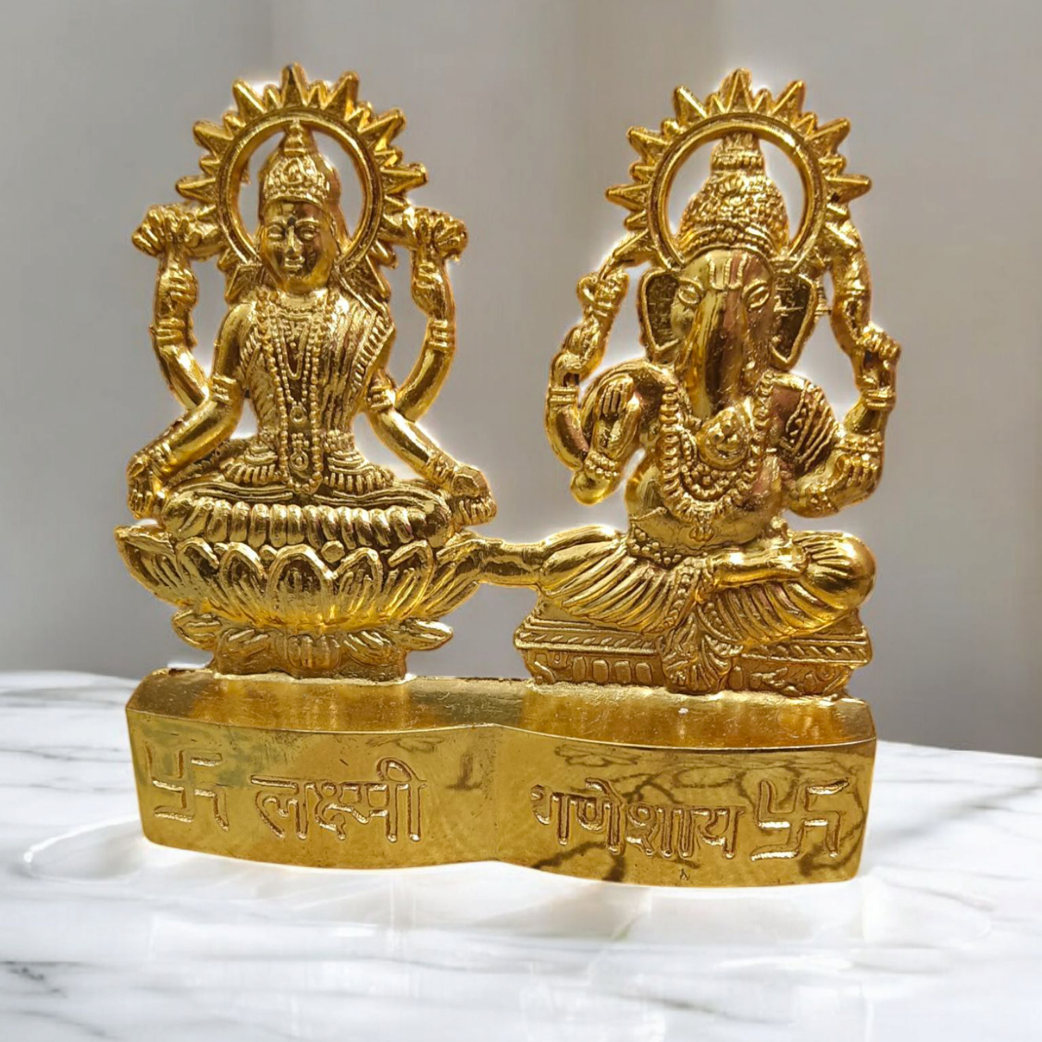 A beautifully crafted Laxmi Ganesh Metal Statue featuring intricate details, symbolizing prosperity, success, and the removal of obstacles.
