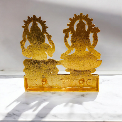 A beautifully crafted Laxmi Ganesh Metal Statue featuring intricate details, symbolizing prosperity, success, and the removal of obstacles.