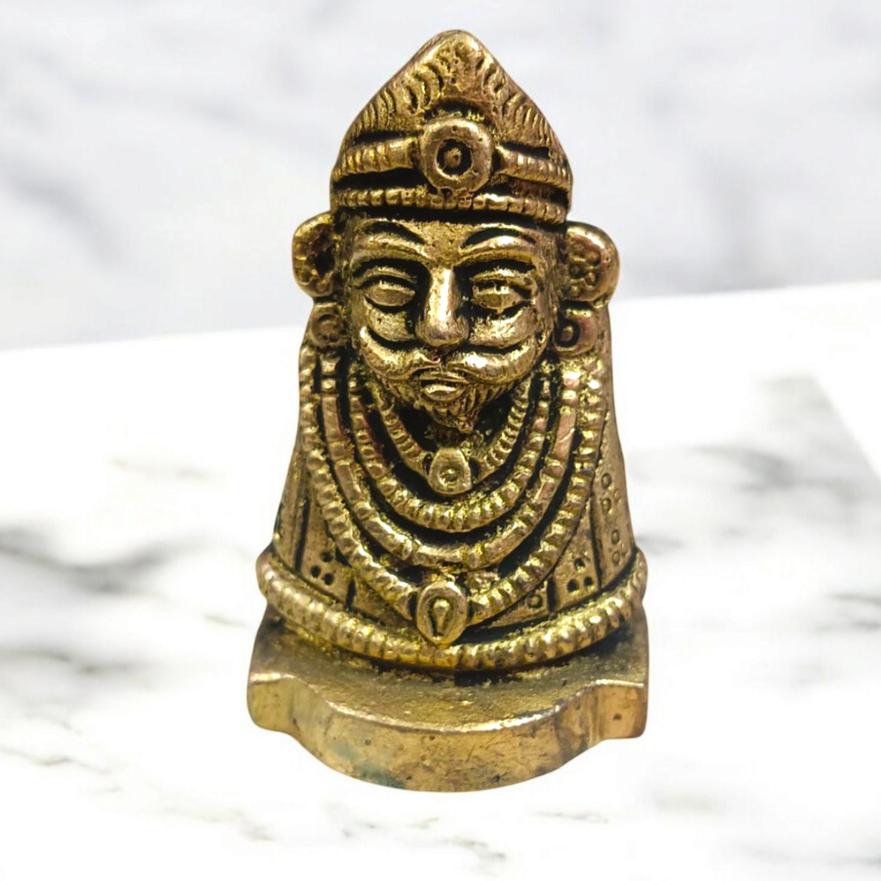 A beautifully crafted Pure Brass Khatu Shyam Idol with intricate details and a polished brass finish, symbolizing blessings of prosperity and protection.