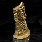A beautifully crafted Pure Brass Khatu Shyam Idol with intricate details and a polished brass finish, symbolizing blessings of prosperity and protection.