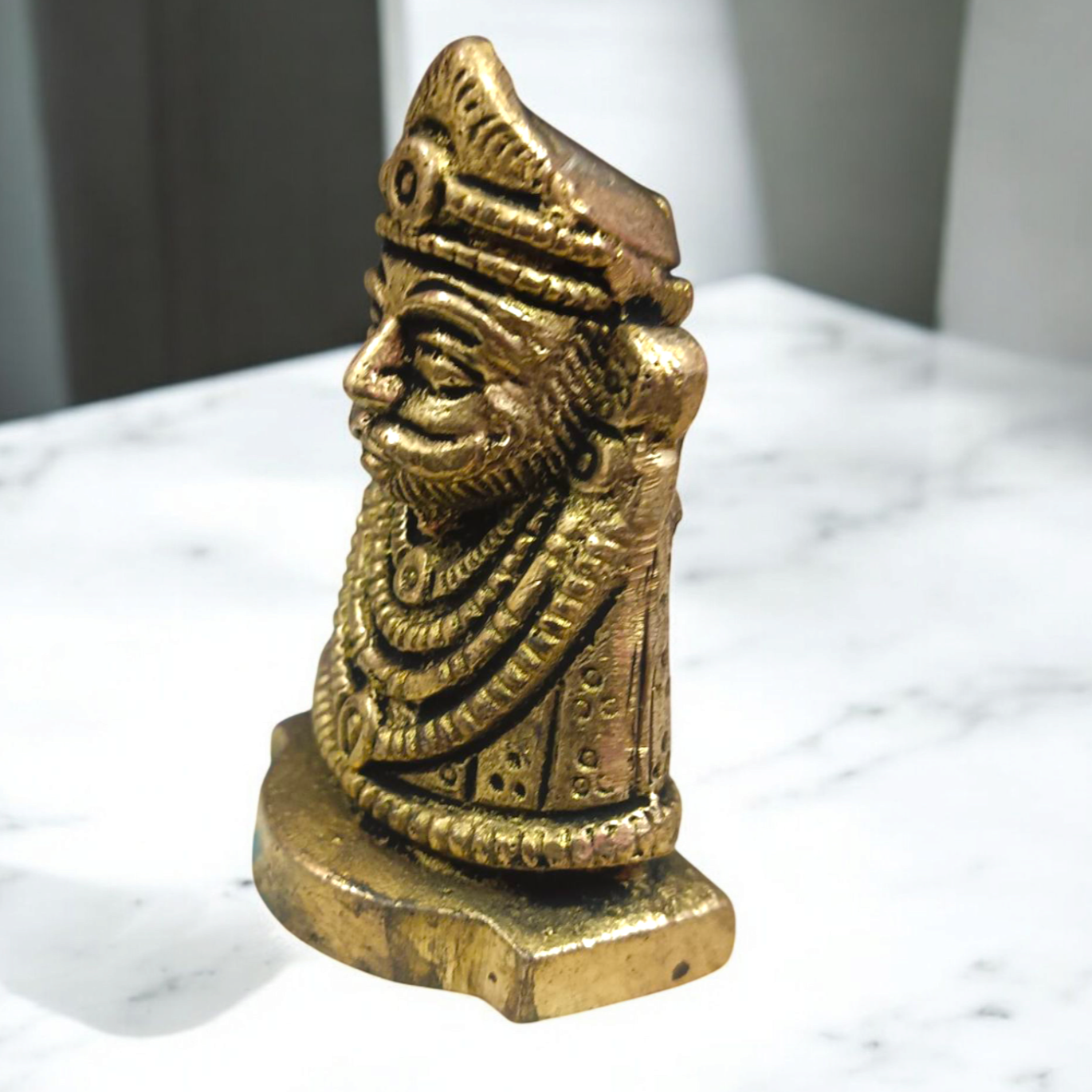 A beautifully crafted Pure Brass Khatu Shyam Idol with intricate details and a polished brass finish, symbolizing blessings of prosperity and protection.