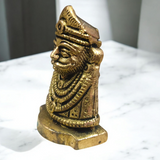 A beautifully crafted Pure Brass Khatu Shyam Idol with intricate details and a polished brass finish, symbolizing blessings of prosperity and protection.