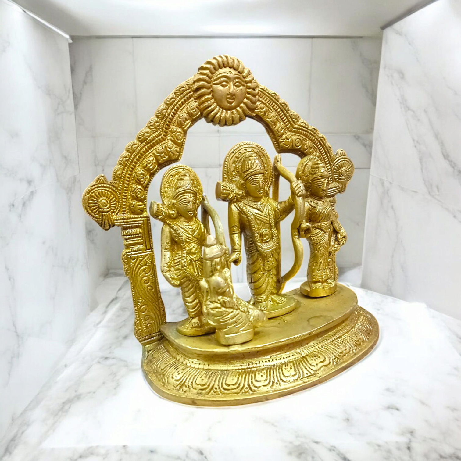 A beautifully crafted brass Ram Darbar idol depicting Lord Ram, Sita, Laxman, and Hanuman Ji, symbolizing devotion, strength, and righteousness.


