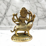 A beautifully crafted brass idol of Maa Durga, also known as Maa Sherawali, symbolizing strength, protection, and divine energy.