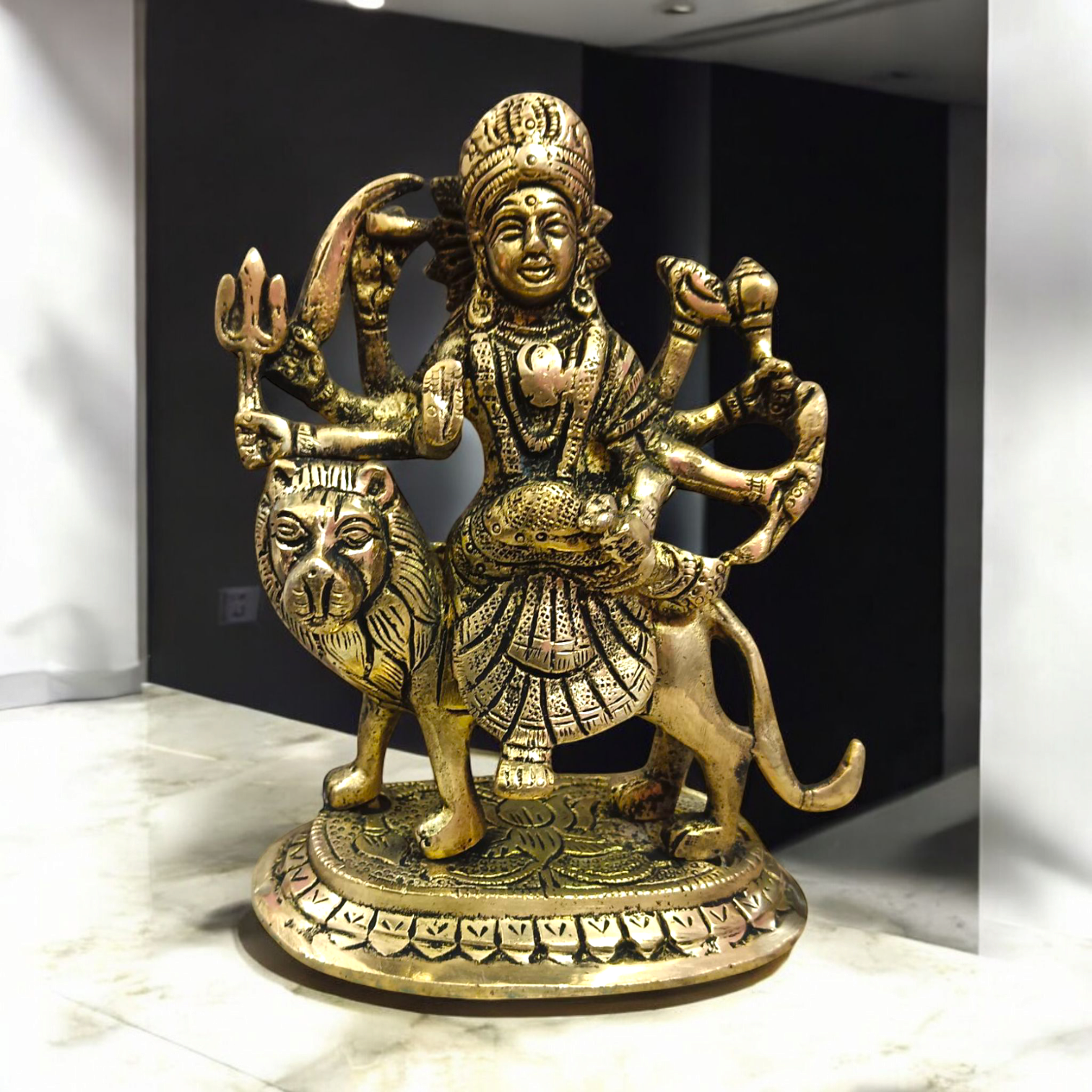 A beautifully crafted brass idol of Maa Durga, also known as Maa Sherawali, symbolizing strength, protection, and divine energy.