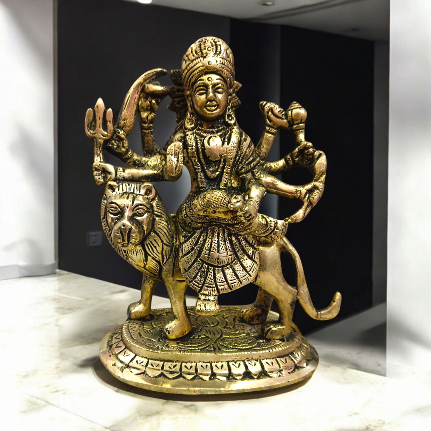 A beautifully crafted brass idol of Maa Durga, also known as Maa Sherawali, symbolizing strength, protection, and divine energy.