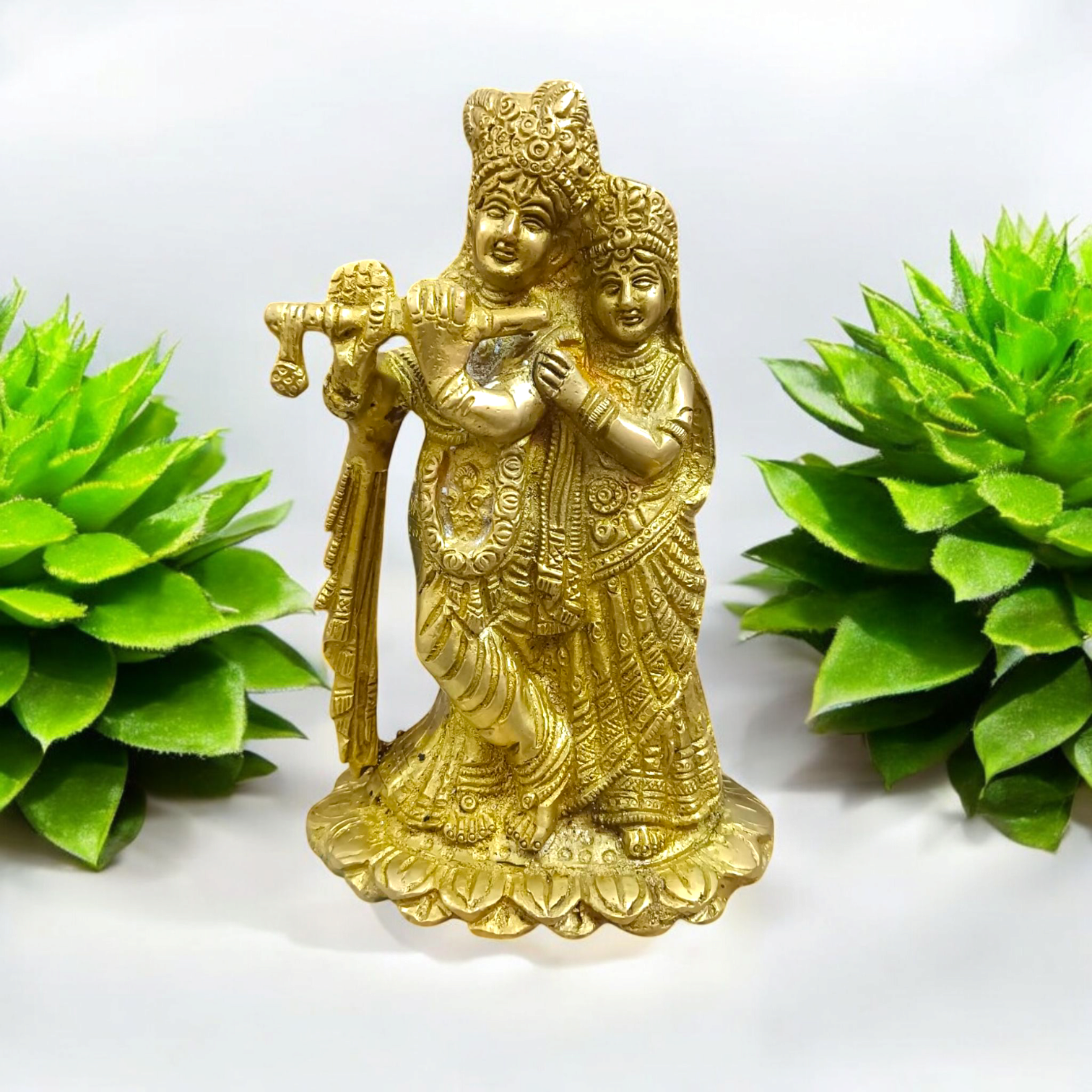 A beautifully crafted brass idol of Radha and Krishna, symbolizing divine love, perfect for worship and home decor.
