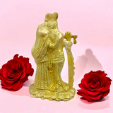 A beautifully crafted brass idol of Radha and Krishna, symbolizing divine love, perfect for worship and home decor.