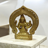A beautifully crafted brass murti of Goddess Lakshmi, featuring intricate details and a golden finish, symbolizing wealth and prosperity.