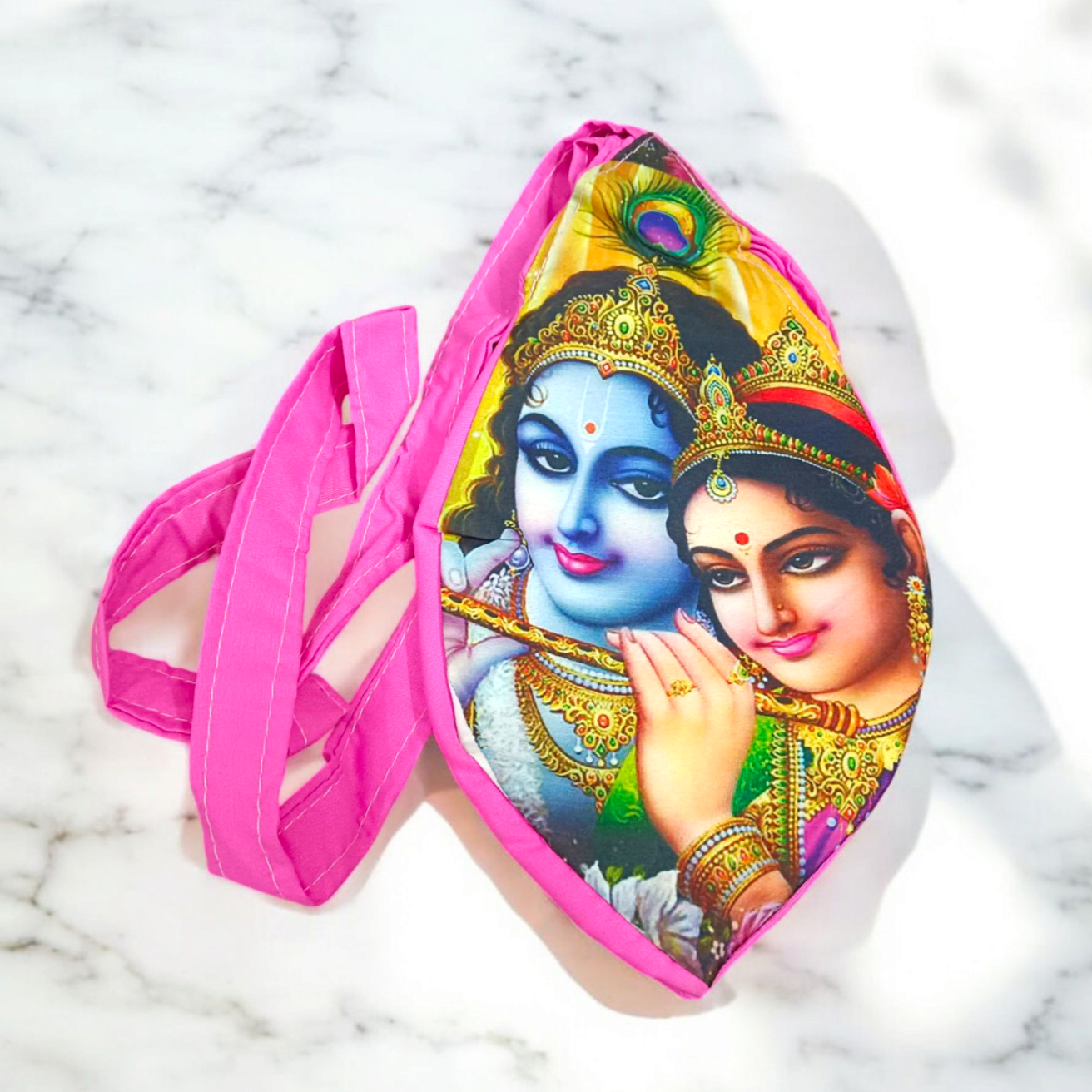 A beautifully designed Radha Krishna Gomukhi Bag made from premium cotton, perfect for storing Japa Mala beads during meditation or religious practices.