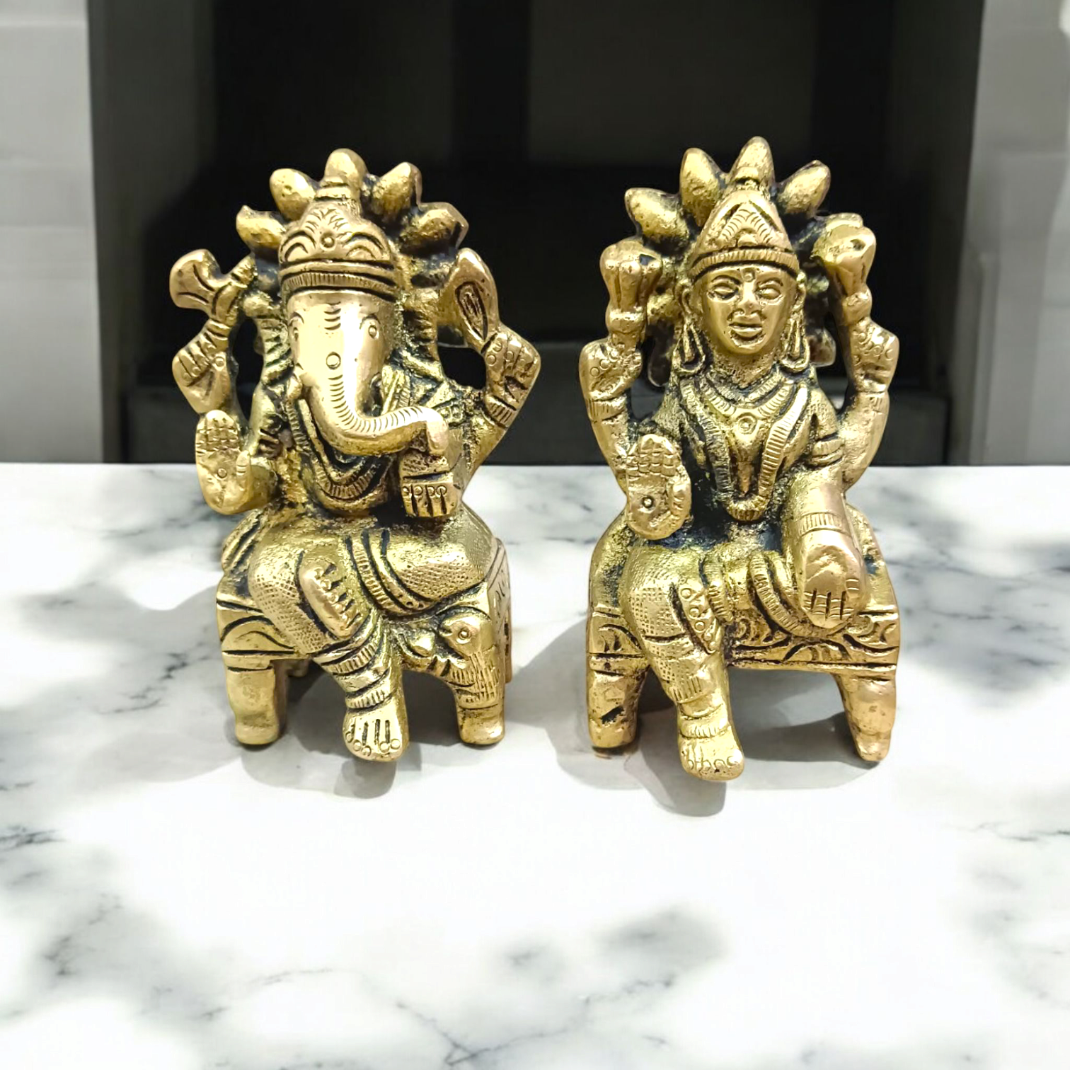 A beautifully detailed Lakshmi Ganesh Brass Murti, symbolizing wealth, prosperity, and the removal of obstacles.