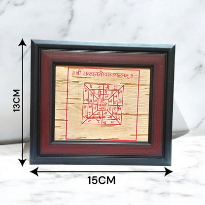 A beautifully framed Santan Gopal Yantra on Bhojpatra, designed for pregnancy protection and fertility blessings.