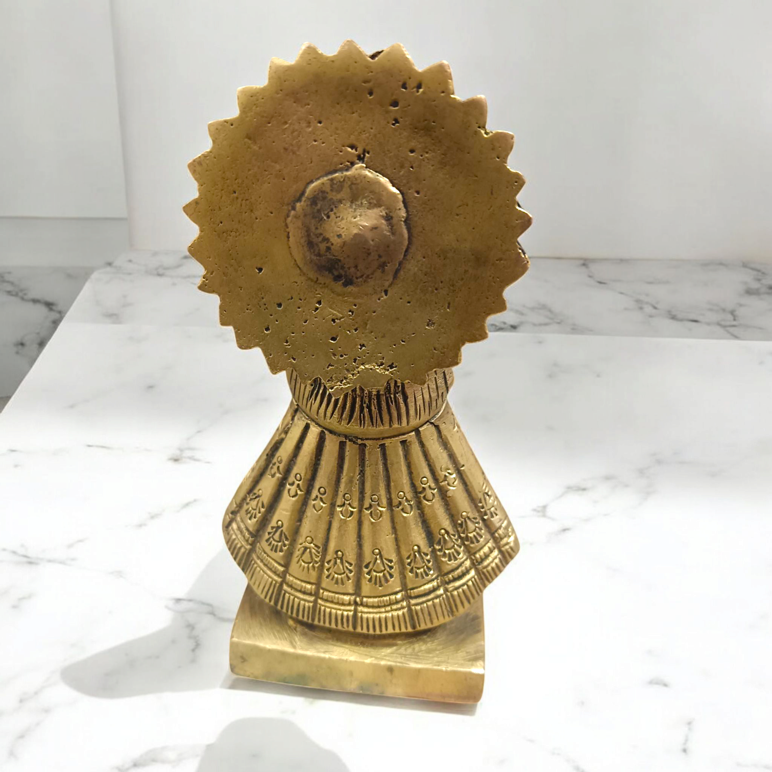 A beautifully handcrafted 4-inch Khatu Shyam Ji brass murti, ideal for worship, bringing prosperity, protection, and divine blessings into the home.