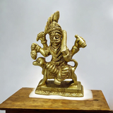 A beautifully handcrafted brass Kal Bhairav idol, 4 inches in size, with intricate detailing and a gold-plated finish, symbolizing protection and strength.

