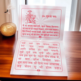 A book titled "Baglamukhi Chalisa" in Hindi with a picture of Maa Baglamukhi’s idol, placed on a divine altar with flowers and incense.