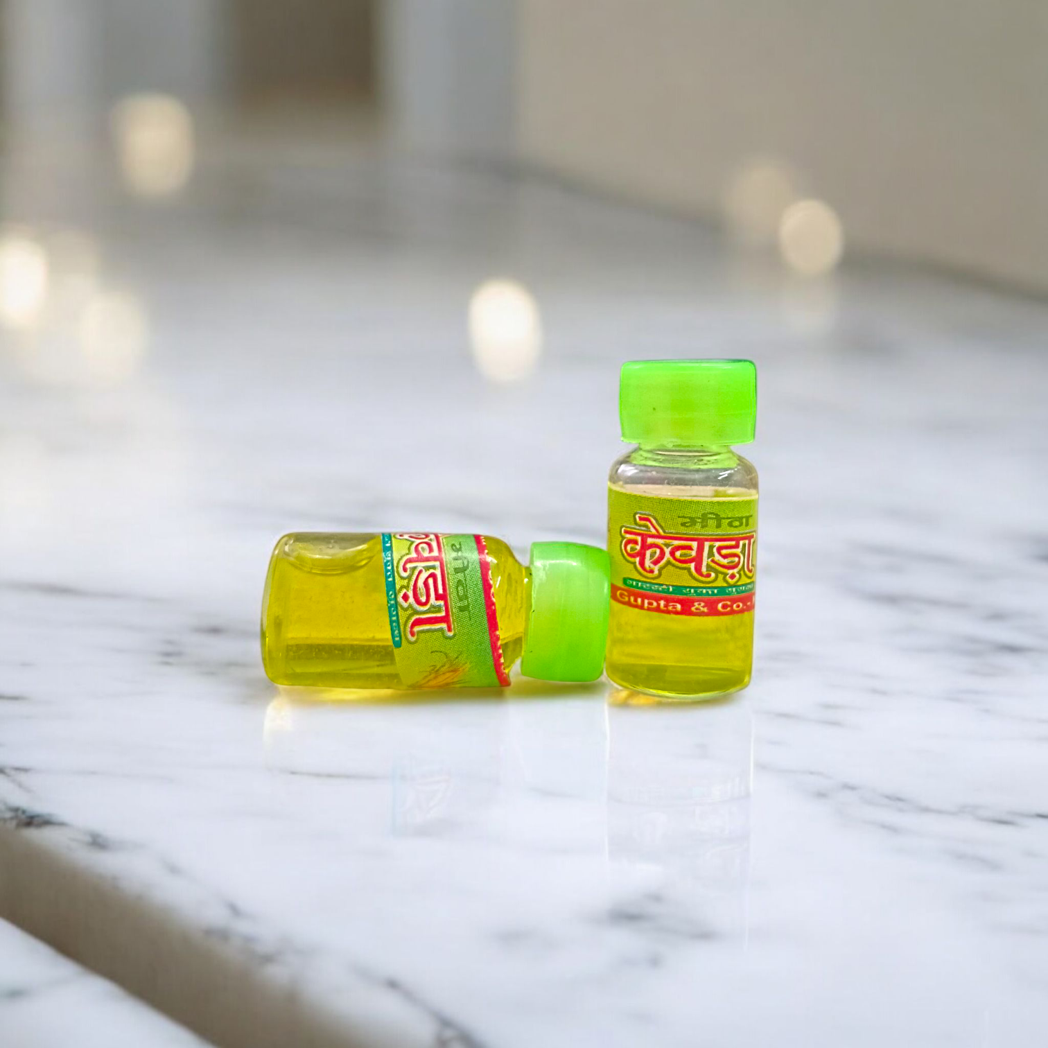 A bottle of Kewra Attar (4ML), alcohol-free, ideal for worship and spiritual practices, with a floral fragrance