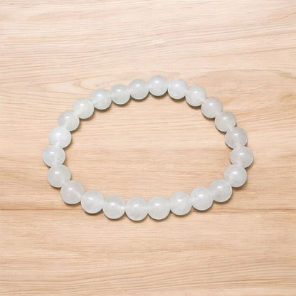 A close-up image of a White Agate (Safed Hakik) Bracelet, showcasing the lab-certified genuine white agate stones
