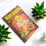 A close-up of a Bhajan Book In Hindi featuring 200+ bhajans and 15+ aartis, with a peaceful spiritual background.