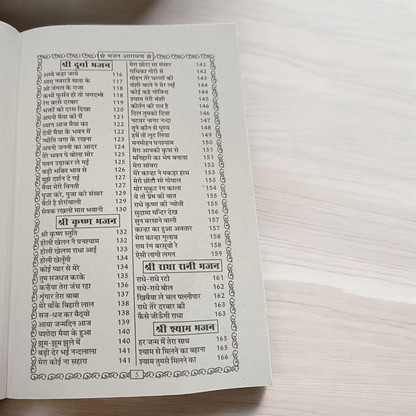 A close-up of a Bhajan Book In Hindi featuring 200+ bhajans and 15+ aartis, with a peaceful spiritual background.